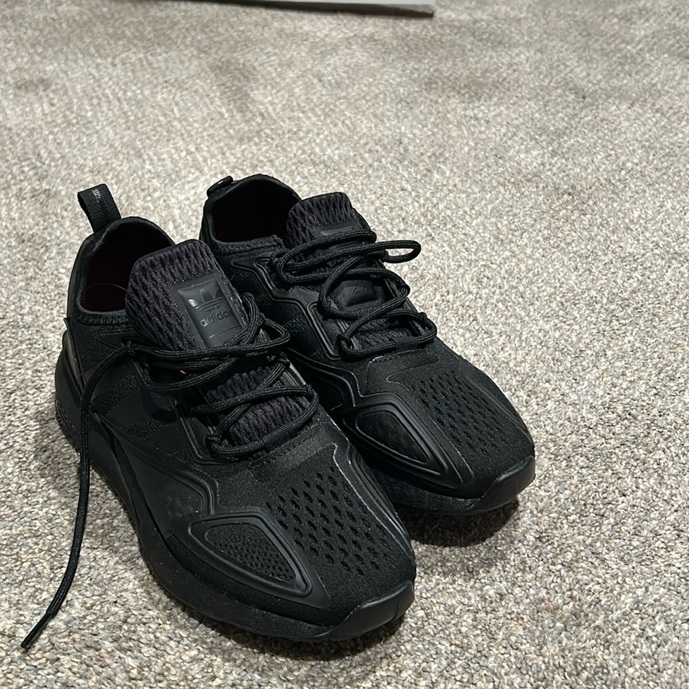 All black adidas sneakers